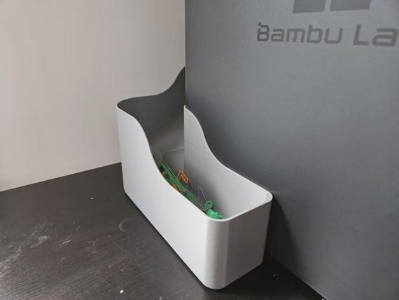 Bambu Lab Filament Chute Wall Mount: 3D Printable Model
