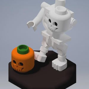 May include: A white skeleton figure with a skull face stands next to an orange jack-o'-lantern with a green stem. The Halloween-themed figures are on a dark brown hexagonal base.
