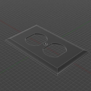 May include: A dark gray electrical outlet cover with two oval openings and a central screw hole. The cover has a beveled edge and is set against a grid background, suggesting a 3D model or technical drawing.