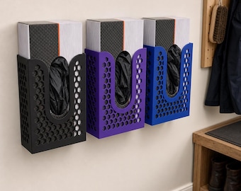 May include: Three wall-mounted storage organizers in black, purple, and blue, each featuring a hexagonal honeycomb pattern and a U-shaped front cutout. Inside each organizer is a rectangular box containing black plastic bags for easy dispensing.