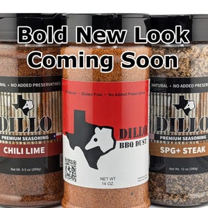 May include: Three clear plastic bottles of Dillo seasoning with black lids. The left bottle is Chili Lime, the center is BBQ Dust, and the right is SPG+ Steak. Each label features a Texas-shaped logo and the text Bold New Look Coming Soon.
