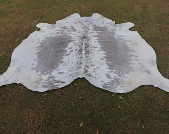 Gray and white cowhide rug Gray spotted / speckled Cowhide rugs