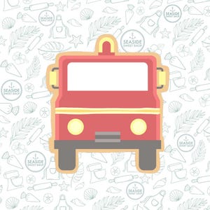 May include: Red and yellow cookie cutter shaped like a vintage delivery truck. The cookie cutter is on a white background with a pattern of various baking and beach-themed illustrations. The text "SEASIDE SWEET SHOP" appears multiple times in the background.