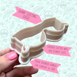 May include: A beige plastic cookie cutter shaped like a pair of sunglasses. The cutter has a thick rounded handle for comfort and grip. The cutter wall is tapered for sturdy cuts. The cutter has a sharp cutting edge.