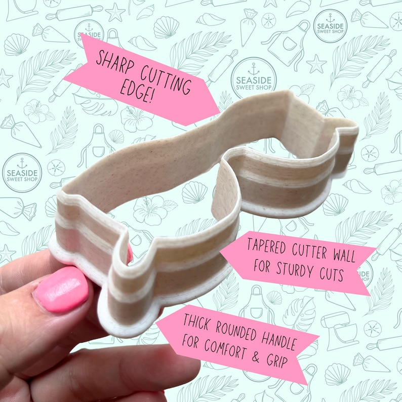 May include: A beige plastic cookie cutter shaped like a pair of sunglasses. The cutter has a thick rounded handle for comfort and grip. The cutter wall is tapered for sturdy cuts. The cutter has a sharp cutting edge.