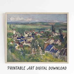 May include: A framed landscape painting depicting a village nestled in a valley. The artwork features houses with blue and red roofs, surrounded by green trees and fields under a cloudy sky. The text "PRINTABLE ART DIGITAL DOWNLOAD" is at the bottom.