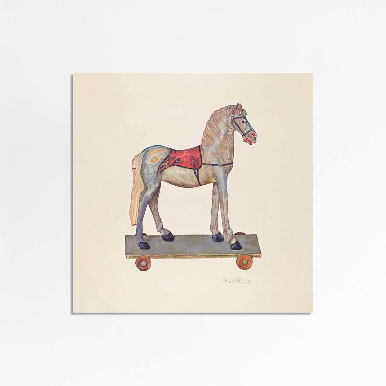 May include: A vintage wooden toy horse with a red and white saddle, painted in shades of blue and gray, on a wooden platform with wheels.