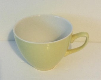 Vintage spare yellow tea cup - 1950s 1960s. Plain. Made in England. Classic cafe shape