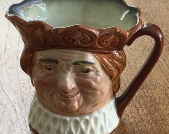 Royal Doulton Small Character / Toby Jug. Old King Cole. Harry Fenton design. Some damage.