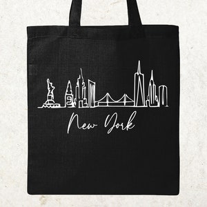 Man with black tote bag  People Images ~ Creative Market