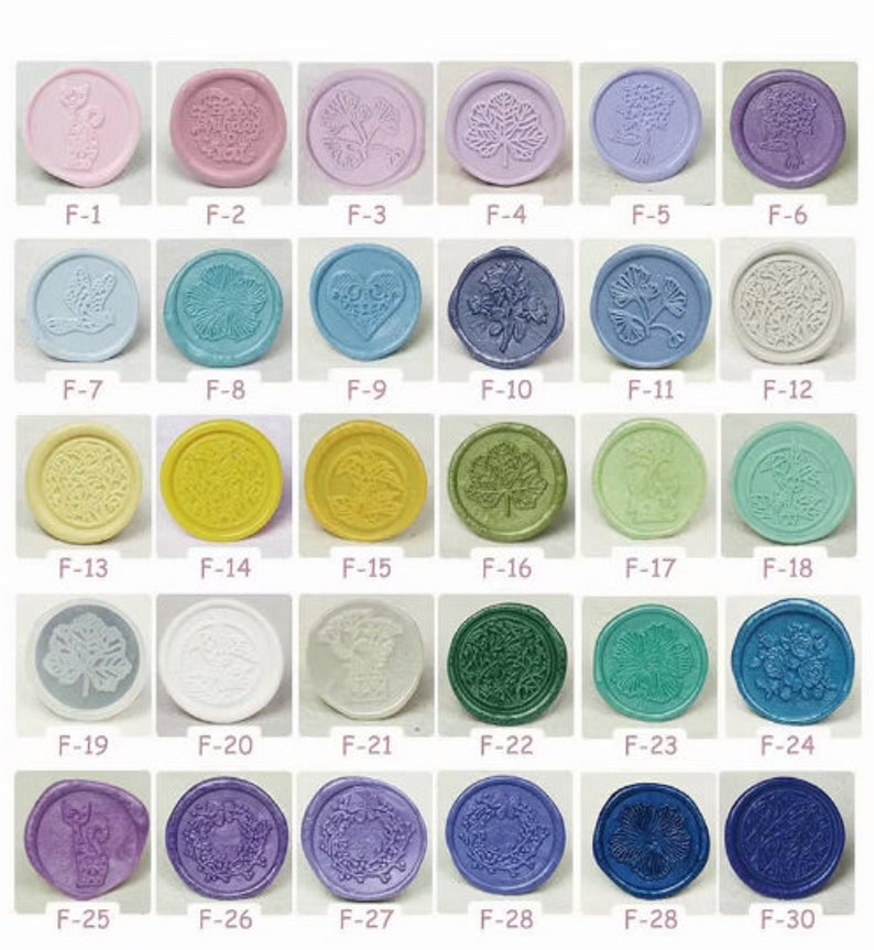 May include: Thirty wax seals with various designs and colors. The seals are round and have a raised design. The designs include butterflies, flowers, hearts, leaves, and geometric patterns. The colors include pink, blue, yellow, green, purple, and white.