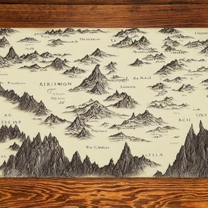 May include: A black and white hand-drawn map of a fictional land with mountains, rivers, and cities. The map is titled "Aircamion" and includes the text "Delleks, Fanllfocar, Tapal, Ylla, Loy, Ach, Nama, Lisesien, Vuohsia, and Folins".