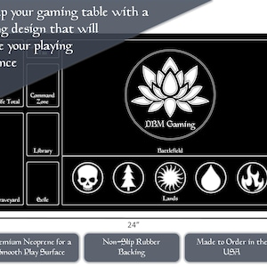 May include: Black gaming mat with a white lotus flower logo and the text "DBM Gaming." The mat is 24 inches wide and 14 inches tall, with designated zones for gameplay. It features a smooth play surface and non-slip backing.