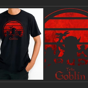 May include: Black t-shirt featuring a red silhouette of a group of goblins against a red sunset with the text "Tribe Goblin" underneath.