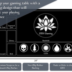 May include: Black gaming mat with a white lotus design and the text "DBM Gaming". The mat has sections for life total, command zone, library, graveyard, exile, and lands. It measures 24 inches by 14 inches.