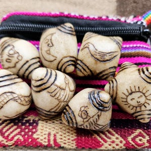 Kuyas chumpi shamanic stones with andean codes symbols chakra healing turquasa