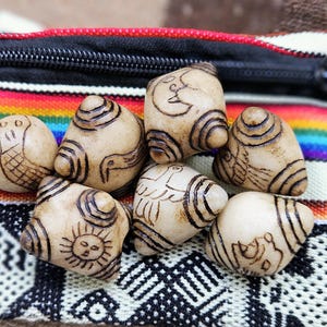 Kuyas chumpi shamanic stones with andean codes symbols chakra healing turquasa