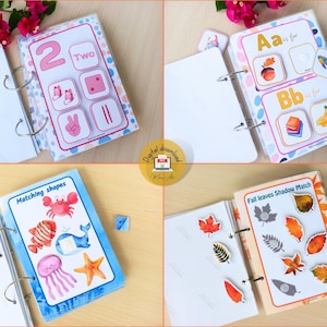 May include: Four different printable activity books with colorful pages and images. The books include activities for matching shapes, learning the alphabet, counting, and matching fall leaves. The books are designed for children and are perfect for educational purposes.
