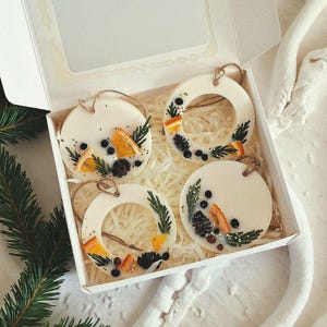 Handmade Christmas wax sachet ornaments gift box with festive winter fragrance and eco friendly holiday decor accents.