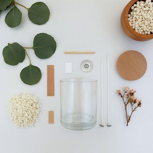 Complete DIY candle making set with woodwick and flowers, perfect gift idea.