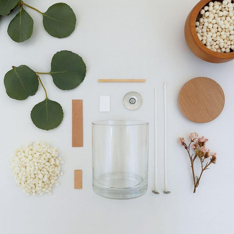 Complete DIY candle making set with woodwick and flowers, perfect gift idea.