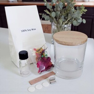 DIY soy candle kit for beginners, includes everything to make your own candles.
Large craft kit for making scented soy candles with dried flowers and woodwick.
Candle art box DIY kit with soy wax and woodwick, perfect for home craft projects.