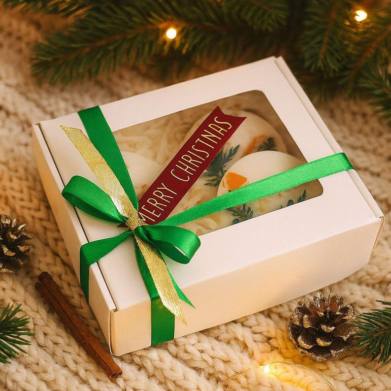 Hand poured vegan soy wax sachets decorated with botanicals, unique handmade Christmas ornaments for cozy interiors.