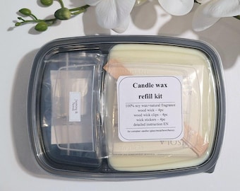 May include: A clear plastic container with a white candle wax refill kit. The kit includes a wood wick, wick clips, and stickers. The label reads "Candle wax refill kit 100% soy wax + natural fragrance wood wick - 4pc wood wick clips - 4pc wick stickers - 4pc detailed instruction EN"