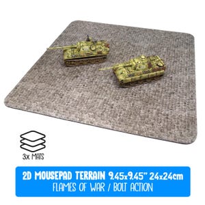 May include: A gray cobblestone-patterned 2D mousepad terrain with two miniature tanks. The mousepad measures 9.45 x 9.45 inches (24 x 24 cm). The text on the mousepad says "2D Mousepad Terrain" and "Flames of War / Bolt Action".