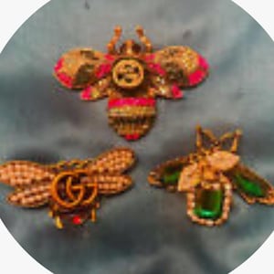 Surprise me Lot!!! 2 Gorgeous Repurposed GG designer Brooches and 2 Free gifts  too!! Gift wrapped and ready to be wowed!!