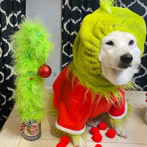 READ ALL Unique 18 inch furry Grinch inspired bent christmas tree table top arrangement in a recycled food can. A must have for a Grinch fan