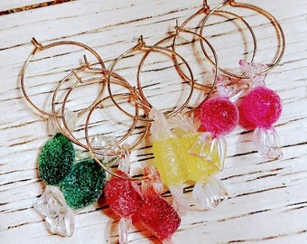 Adorable gold dipped glittery candy hoop earrings. Choose between 4 colors