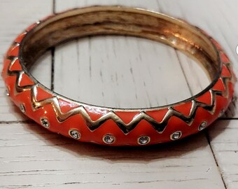 1990s orange enamel rhinestone bangle bracelet