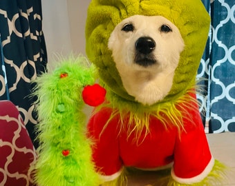 Adorable Little 12 inch furry Grinch themed bent christmas tree  table top arrangement.