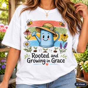 Christian garden watering‑can design with cheerful blue can, straw hat, flowers, bees and sprouts, ‘Rooted and Growing in Grace’ inspirational message on white women’s T‑shirt, rustic farmhouse religious mom apparel, digital PNG sublimation download.