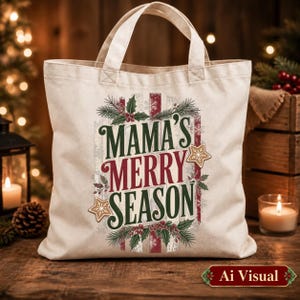 May include: A cream-colored canvas tote bag featuring the text MAMA'S MERRY SEASON in dark green and red lettering. The design is decorated with illustrations of holly leaves, red berries, pine branches, and two tan-colored star-shaped cookies.