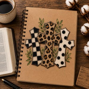 Digital sublimation instant download of A spiral-bound notebook or journal with a tan cover featuring three decorative crosses. The left cross has a black and white checkerboard pattern, the center cross has a brown leopard print, and the right cross has a white and black polka dot pattern. PNG file transfer.