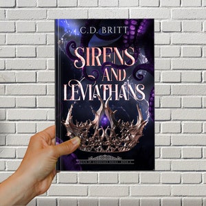 May include: Book cover with a dark blue background featuring a purple and black octopus, a silver crown, and the title "Sirens and Leviathans" in white lettering. The text "Reign of Goddesses Series - Book 2" is at the bottom of the cover.