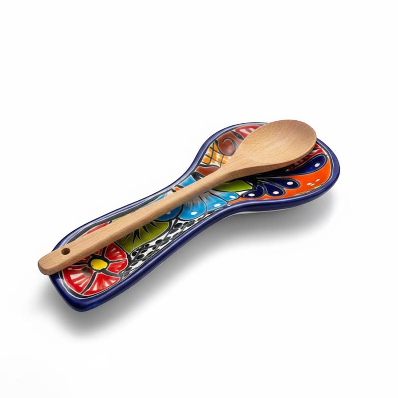 The Talavera Hub colorful Mexican Talavera ceramic spoon rest with floral and butterfly motifs. Hand-painted kitchen utensil holder.