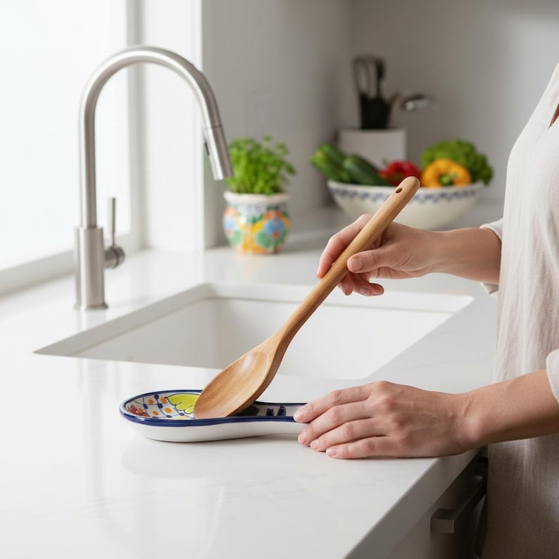 The Talavera Hub colorful ceramic spoon rest with floral Talavera design. Hand-painted, lead-free glaze.
