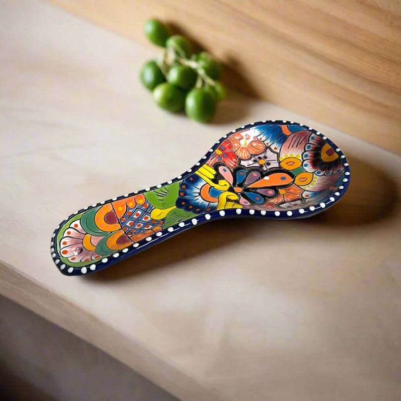 Hand-Painted Talavera Spoon Rest | Colorful Mexican Kitchen Decor showing a hand-painted floral Talavera spoon rest with vibrant colors and dot border