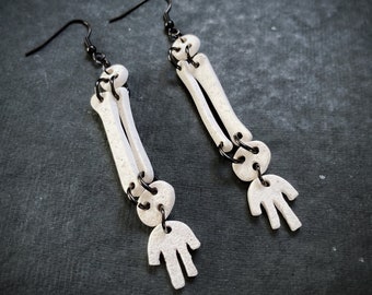 Unique, hand-cut skeleton arm earrings / Spooky Halloween earrings or everyday accessories / Limited edition polymer clay dangle earrings