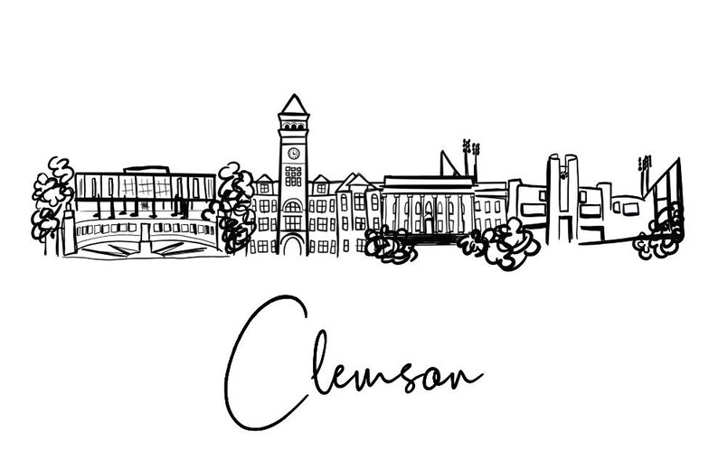 May include: Black and white line drawing of the Clemson skyline, featuring buildings, a clock tower, and trees. The word "Clemson" is written in cursive below the skyline. The image is on a white background.