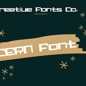 May include: A graphic design featuring the text "Creative Fonts Co." in white, block letters at the top. Below, the word "CERN FONT" is displayed in a similar style, set against a gold brushstroke on a dark teal background. Small starbursts are scattered around.