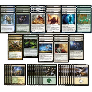 May include: A collection of 30 Magic: The Gathering cards, including creatures, enchantments, and lands. The cards feature various illustrations, including a green snake, a blue spirit, and a red hyena. The cards are arranged in a grid pattern on a white background.