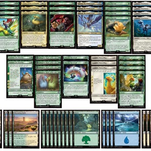 May include: A selection of Magic: The Gathering trading cards. The cards display fantasy artwork, including birds, landscapes, and characters. The colour scheme includes greens, blues, yellows, and browns. The cards are arranged in rows and columns.