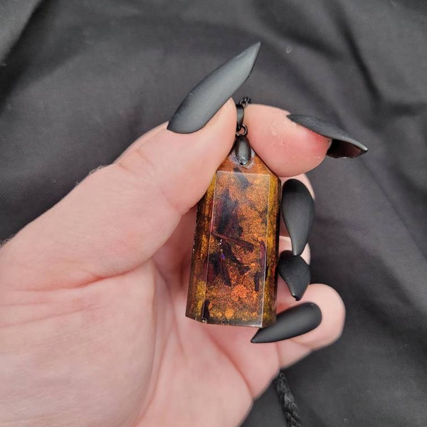Multichrome Resin Pendant with Black-Green-Red-Orange Shift and Dried Roselle Flower