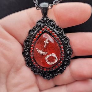 The Masquerade: Black and Red Goth Resin VTM VTMB Teardrop Necklace with Bat, Vampire Fangs, and Ankh
