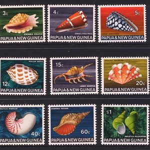 May include: A sheet of 16 postage stamps from Papua New Guinea featuring colourful illustrations of various seashells. The stamps are arranged in four rows of four, with each stamp featuring a different seashell and its scientific name.