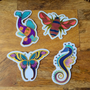 Stickers dorés recto-verso, papillon, poisson, abeille et hippocampe